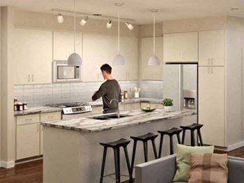 Chef’s kitchen with quartz countertops, gas range, pantry, designer backsplashes, and 42” european cabinets